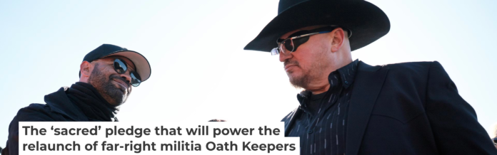 Enrique Tarrio, left, former leader of the far-right group the Proud Boys, shakes hands with Oath Keepers founder Stewart Rhodes in Washington on Feb. 21, 2025. Chip Somodevilla/Getty Images